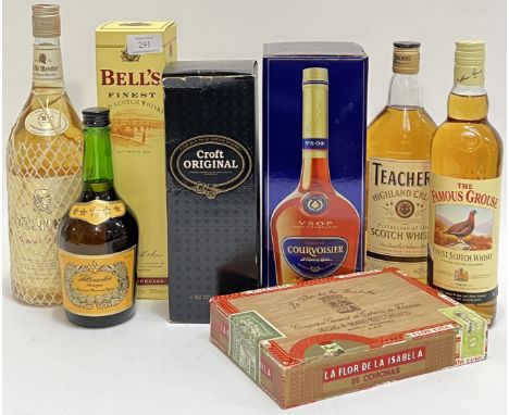 A group of spirits to include; a 70cl bottle of Bells finest Scotch whisky; a 70cl bottle of Teacher's old scotch whisky; a 7