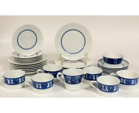 A Royal Worcester blue and white ribbed near complete tea service comprising a creamer jug, a sugar bowl, six side plates (w-