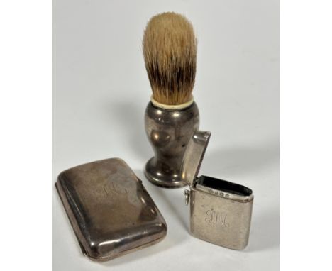 An Edwardian Chester silver cigarette case with engraved initials TA and gilt interior, Chester 1904, ( L x 8cm),  a Birmingh
