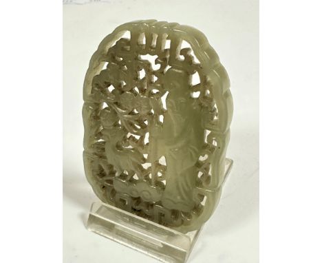 A Chinese celedon Jadite piecrd carved  panel depicting a Lohan and dear in a forest, possibly for a box. L 7.5cm x W 5.5cm, 