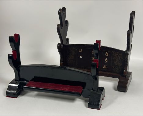 A mid 20thc. samurai sword rack, brown lacquered finish with mother of pearl inlay, suitable for five swords (46 x 46 x 21), 