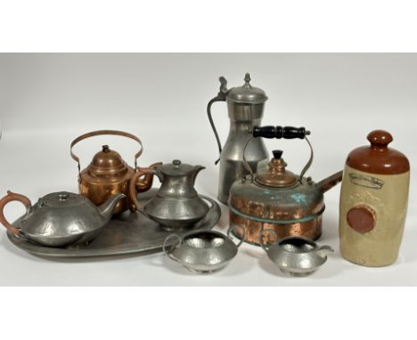 A mixed group comprising a Timothy Whites &amp; Taylors stoneware bed warmer (h- 26cm), a small hammered brass kettle (h- 21c