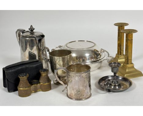 A group of Epns ware to include, a hot water pot, two christening mugs, a chamber candle stick, a muffin dish and cover, a pa