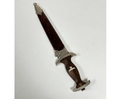 A WWII German SA dagger in original scabbard, chip and two cracks to wooden handle. R2. M7/66 1942 marks to blade