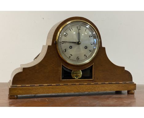 An early 20th century oak cased mantel clock, the silvered dial with Arabic chapter ring, later quartz movement H29cm