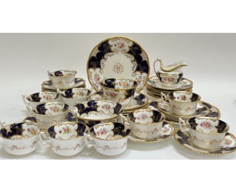 A 'Batwing' Coalport china tea/coffee service decorated with floral sprays in polychrome enamels and gilt comprising ten cups