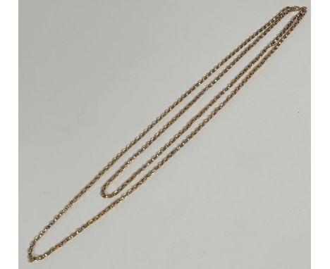 A Victorian style 9ct gold double oval link guard chain necklace with circular clip fastening and ring loop, (L 74cm). 45.9g