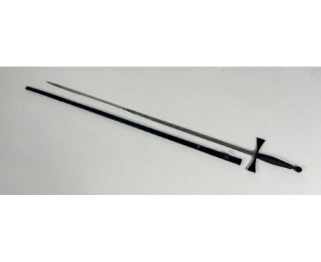 A Masonic sword with black fittings and leather scabbard, etched blade, TOYE. KENNING AND SPENCER (overall: 87cm)