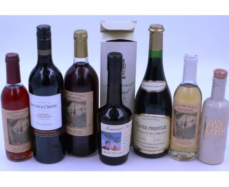 Seven bottles of mixed alcohol including 50cl cider brandy. Not available for in-house P&amp;P 