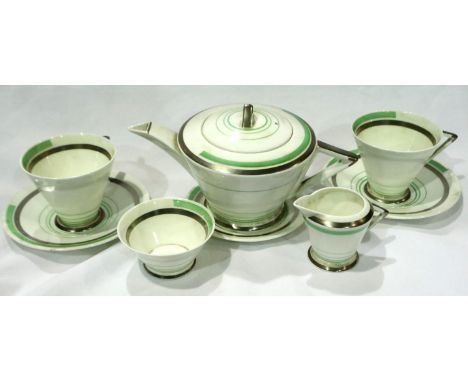 Shelley Art Deco tea service, eight pieces. Hairline crack to one cup, chip to rim on one plate. Not available for in-house P