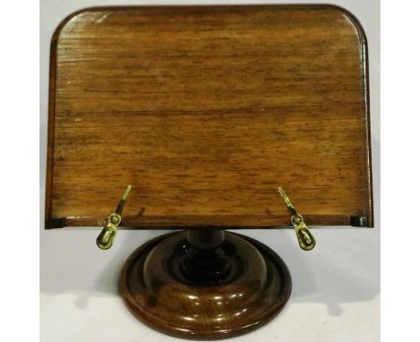 Brass bound oak bookstand on circular base, H: 26 cm. P&amp;P Group 3 (£25+VAT for the first lot and £5+VAT for subsequent lo