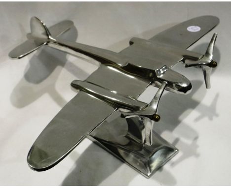 Chrome desk aircraft with twin rotating propellers, wing span 35 cm. P&amp;P Group 3 (£25+VAT for the first lot and £5+VAT fo