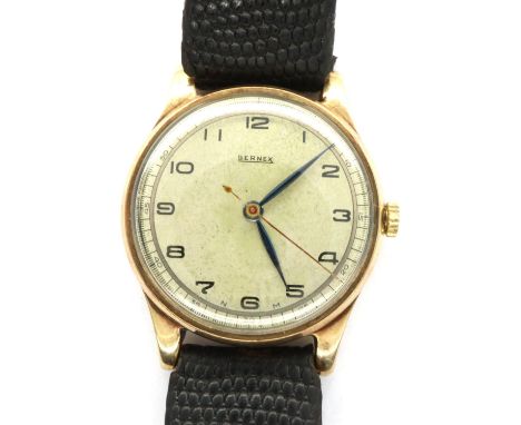 Bernex: gents 9ct gold wristwatch on a leather strap, working at lotting. P&amp;P Group 1 (£14+VAT for the first lot and £1+V