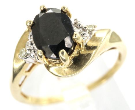 9ct gold dress ring set with a central sapphire and diamonds, size P, 2.3g. P&amp;P Group 1 (£14+VAT for the first lot and £1