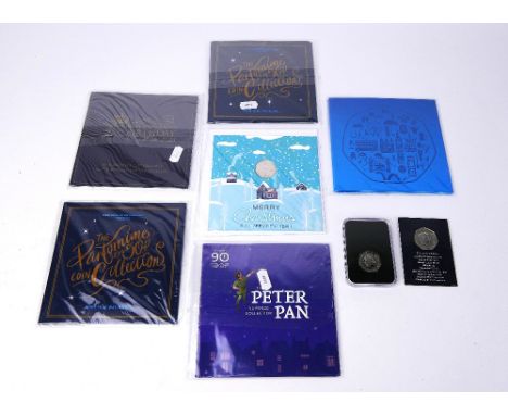 Six 50p collectors packs, three packs of five pantomime 50p coin collection x 2 and London, together with three single coin c