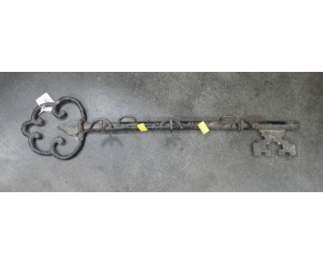 Metal key form coat rack