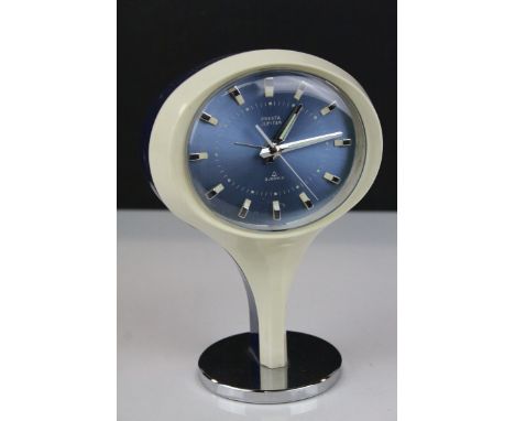 Mid 20th century / Retro ' Presta Jupiter ' Mantle Clock with Blue Face, raised on an atomic form base, 18cms high