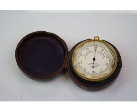 A late 19th century pocket barometer by J.H. Steward Ltd of London complete with original travel case.
