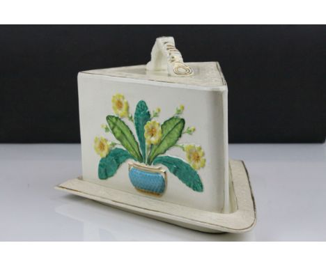 Late 19th / Early 20th century Ceramic Wedge Cheese Dish and Cover, decorated with Majolica Flowers in a Bowl, 24cms high