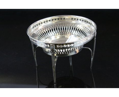 Early 20th century Asprey &amp; Co silver bon bon dish, pierced body, raised on four tapered legs, cast garland decoration to