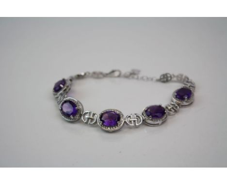 Substantial Amethyst and Cz Line Bracelet set in Silver