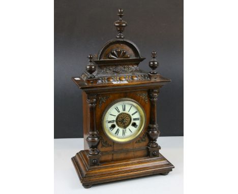 Late Victorian Eight Day Oak Cased Mantle Clock, the white enamel dial with Roman Numerals, 46cms high