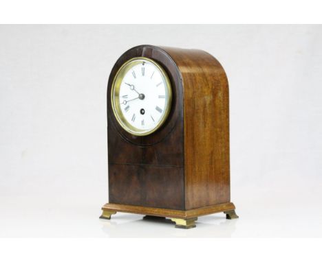 Edwardian Mahogany Domed Cased Mantle Clock, white enamel face with Roman Numerals, raised on Brass Feet, 25cms high