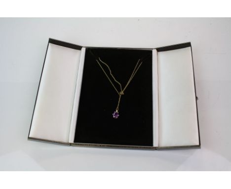 A fully hallmarked 9ct gold and amethyst pendant on a 9ct gold necklace.