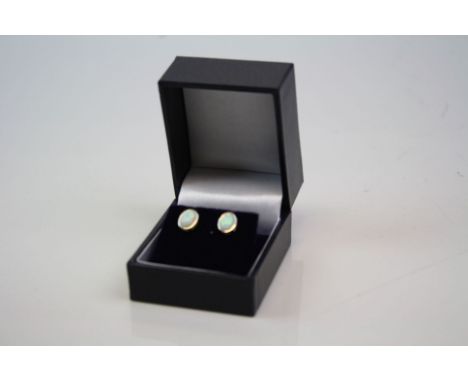 Pair of Silver and Opal Stud Earrings