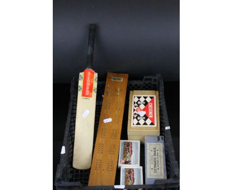 A group of items to include miniature cricket bat ,cribbage board and cards domonoes set and chessman chess set.