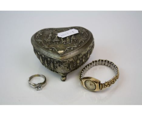 A small heart shaped white metal jewellery box together with a 9ct gold cased ladies watch and a white metal ladies ring mark