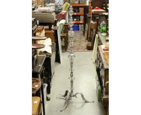 Metal and Glass Standard Lamp raised on three splayed feet, 154cms high