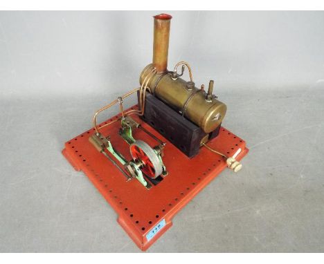 Mamod - An unboxed and unmarked stationary steam engine (possibly by Mamod). The engine on red metal base measuring approxima