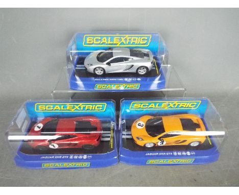 Scalextric - three 1:32 scale Scalextric cars comprising two Jaguar XKR GT3 and a McLaren MP4-12C in silver, all appear mint 