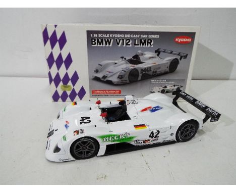 Kyosho - A BMW V12 LMR in 1:18 scale in 1999 Sebring winning livery # 42. The model appears in Mint condition, the outer box 