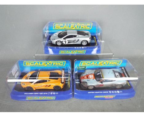 Scalextric - three 1:32 scale Scalextric cars comprising a Scalextric Club Aston Martin DBR9 #C2965, a McLaren MP4-12C GT3 #C