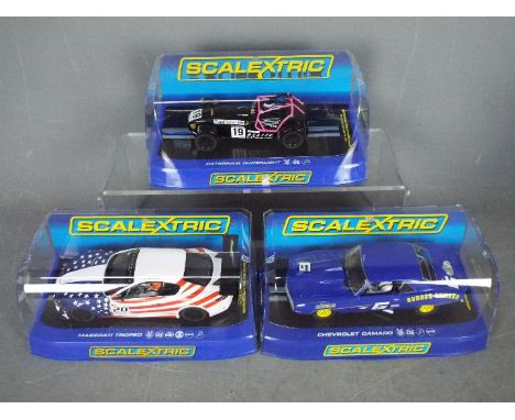 Scalextric -  Three boxed Scalextric slot cars. Lot includes Scalextric C3647 Caterham Superlight CS Championship 2014 ; C360