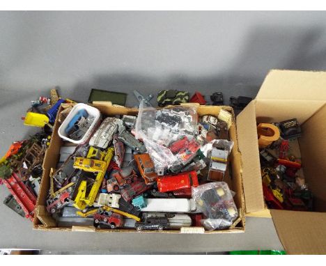 Matchbox, Dinky Toys, Corgi Toys - A collection of unboxed and playworn diecast vehicles in several scales. Lot includes Matc