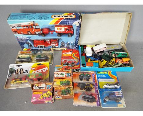 Matchbox, Corgi Juniors - A mixed collection of boxed and unboxed diecast model vehicles predominately Matchbox. Lot includes