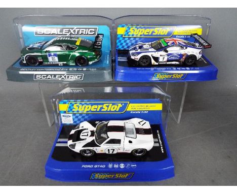 Scalextric, Superslot -  Three boxed 1:32 scale slot cars. Lot includes Scalextric C3713 Bentley Contintental GT3 ADAC Nurbur