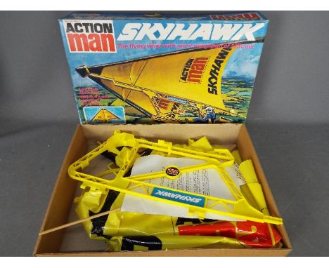 Palitoy, Action Man - A boxed vintage Palitoy Action Man Skyhawk which shows signs of play and use and is unchecked for compl