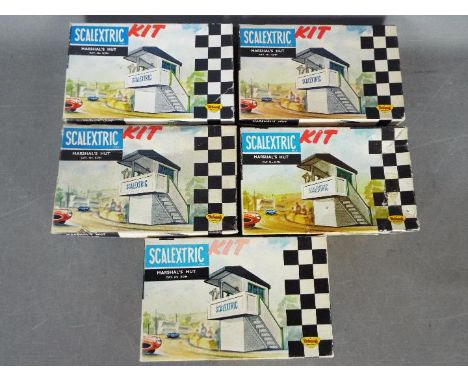 Scalextric, Triang - Four boxed vintage Scalextric K/704 Marshal's Hut plastic model kits plus one K/704 empty box. Kits have