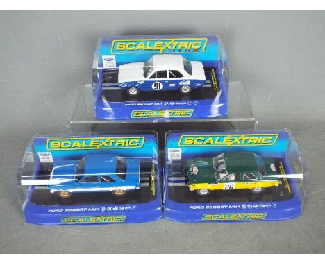 Scalextric -  Three boxed Scalextric Ford Escort Mk.1 slot cars. Lot includes Scalextric C3672 1970 Calder park Alan Moffat; 