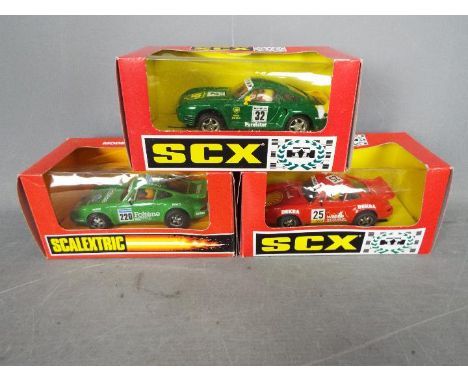 Scalextric - SCX - 3 x Porsche slot cars including 911 # 83590, 959 # 83660, 953 # 8335. All the cars appear in Near Mint con