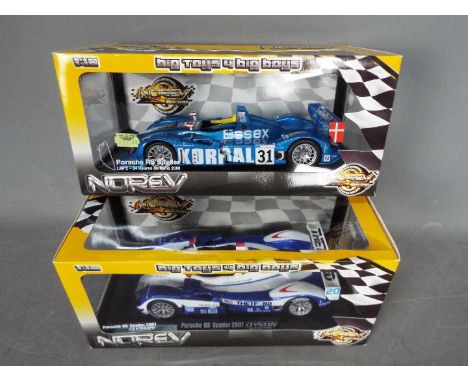 Norev - 2 x Porsche RS Spyder Le Mans cars in 1:18 scale. # 187518, # 187519. Both cars appear in Mint condition in Very Good