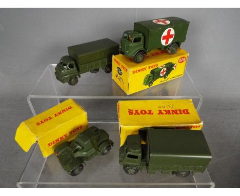 Dinky Toys - A collection of 4 predominately boxed diecast military toys. Lot consists of #626 Military Ambulance; #670 Armou