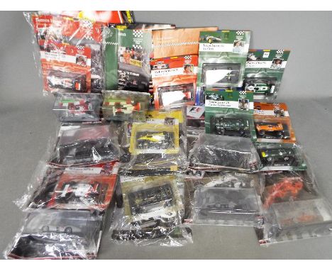 Pannini Fi, Editorial Sol - A starting grid of 17 boxed diecast model F1 racing cars from the Paninni Formula 1 Car Collectio