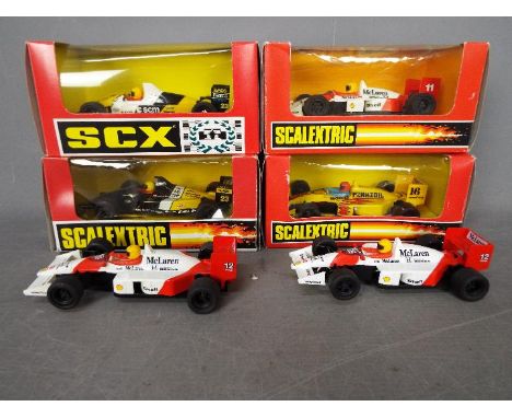 Scalextric - SCX - A group of 6 x Formula 1 slot cars including 2 x loose McLaren MP4, 2 x boxed McLaren F1, 2 x boxed Minard