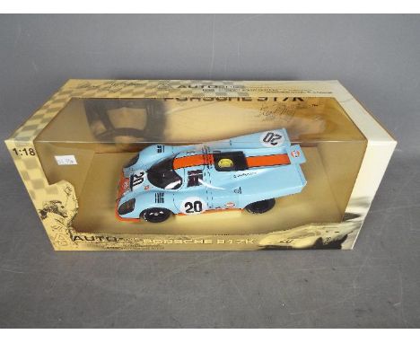 Autoart - Steve McQueen Porsche 917K in 1:18 scale in Gulf colours from the movie Le Mans. The car appears in Mint condition,