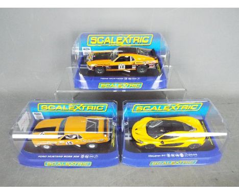 Scalextric - three 1:32 scale Scalextric cars comprising McLaren P1 #C3644, Ford Mustang Boss 302 #C3651 and Ford Mustang #C3